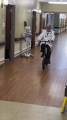 Doctor Loses Balance and Falls While Cycling Through Hospital Hallway