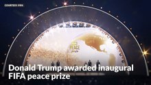 Donald Trump awarded inaugural FIFA peace prize at World Cup draw