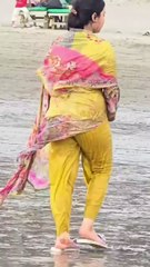 Indian aunty walking at beach. #beach #indian #desi #aunty