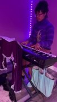 Woman Plays Piano While Her Sugar Gliders Adorably Glides on Her
