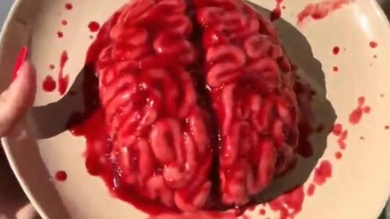 Baker transforms simple ingredients into a gory yet irresistible Halloween 'brain' cake