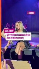 Lara Fabian reçoit des cadeaux de ses fans en plein concert