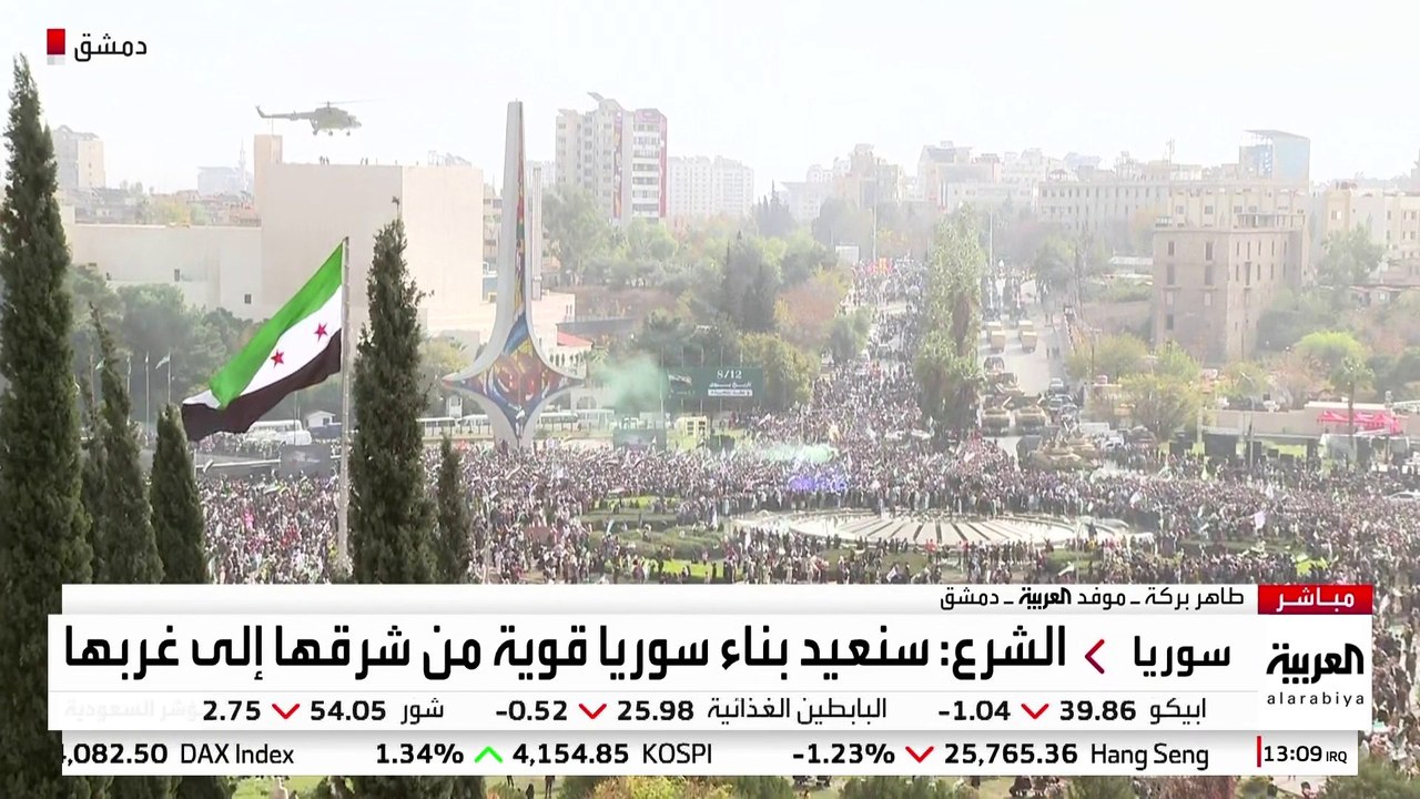 موفد العربية طاهر بركة يرصد جانبا من العرض العسكري المقام في ساحة الأمويين بدمشق