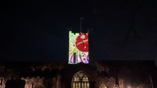 Festive adverts were projected onto Crediton Parish Church (Will Goddard, Crediton Courier)