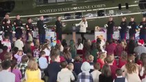Melania Trump Brings Christmas Spirit to Quantico in Toys for Tots Charity Visit