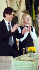 Leo helps Evelyn solve her problem and successfully proposes to her at the party.