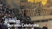 Syrians Celebrate Anniversary of Al-Assad Fall in Roman Theatre