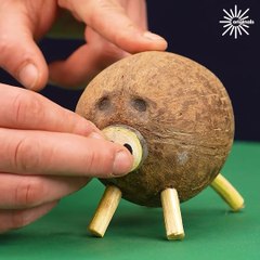 Transforming a simple shell into a cute piggy bank! 🥥💸