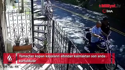 Yamaçtan kopan kayaların altından kalmaktan son anda kurtuldular