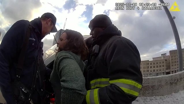 Dramatic moment shows cops rescuing FBI agent from car dangling from overpass