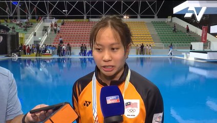 Phee Jinq En raih gangsa saingan 50m kuak dada