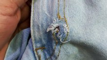 Can ripped denim fabric be repaired and worn?