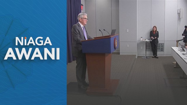 Divided Fed lowers rates, signals pause and one 2026 cut