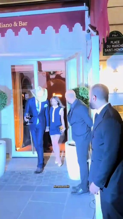 Post Malone and his girlfriend Christy Lee leave the Siena restaurant in Paris.