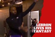 LeBron James warms up with a golf swing six minutes before the game