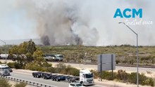 Dangerous, out-of-control bushfire burns in Perth suburb