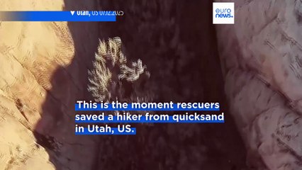 Moment hiker rescued from quicksand after activating SOS signal