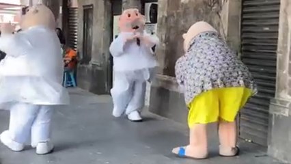 Dr. Simi pushes Mr. Beach Simi during the dance and sends him tumbling