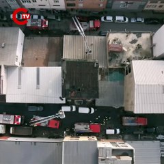 Sultangazi'de bir binada çıkan yangında can pazarı Alevlerin arasından atladı