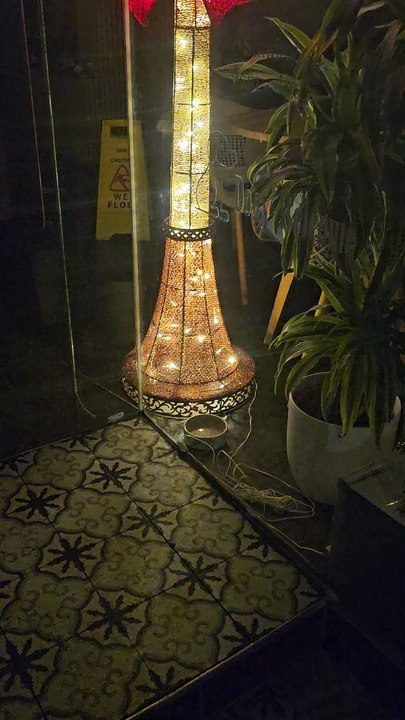 2 meter tall Stunning Christmas Lampost in a barbar shop window display in Hayes dec12th25uk