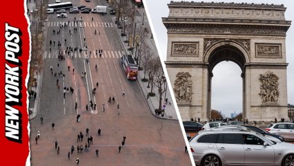 Climate Activists ARRESTED for Painting Around the Arc de Triomphe in Paris