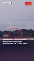 personas atrapadas en el río piraí