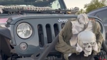 Spectacular Halloween display in Las Vegas features a Jeep packed with cool skeletons