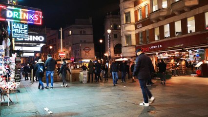 City Night Walk – People on a Busy Commercial StreetA peaceful and cinematic walk through a busy commercial street at night. People enjoying the city lights and nightlife. Ideal global content for viewers who love urban atmosphere, travel vibes,