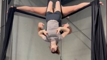 Circus duo showcases strength and precision via a breathtaking aerial stunt