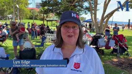 Lyn Edge from the Wollongong Salvation Army shares a Christmas message at Osborne Park, Wollongong.
