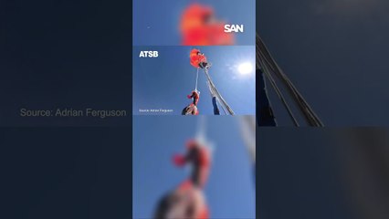 Skydiver hangs at 15,000 feet after parachute catches on plane