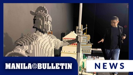 Visitors check out different LEGO builds at Brickman™