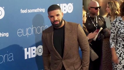 Drake Confuses Fans By Posing With Taylor Swift Look-Alike On ‘Speak Now’ Re-Release Day