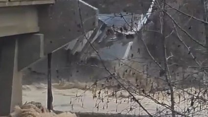 Bridge collapses into river as flooding hits Montana