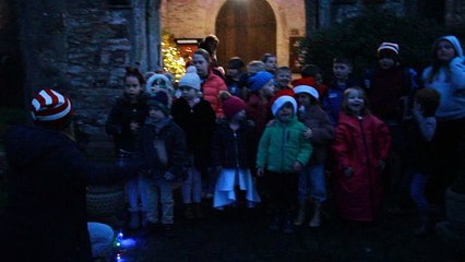 Carol singing by pupils of Porlock First School during the village's Christmas lights switch on, filmed by George Ody.