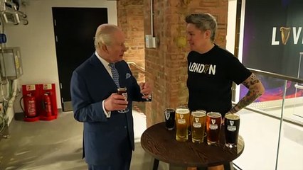 King Charles tries Guinness as he opens new brewery