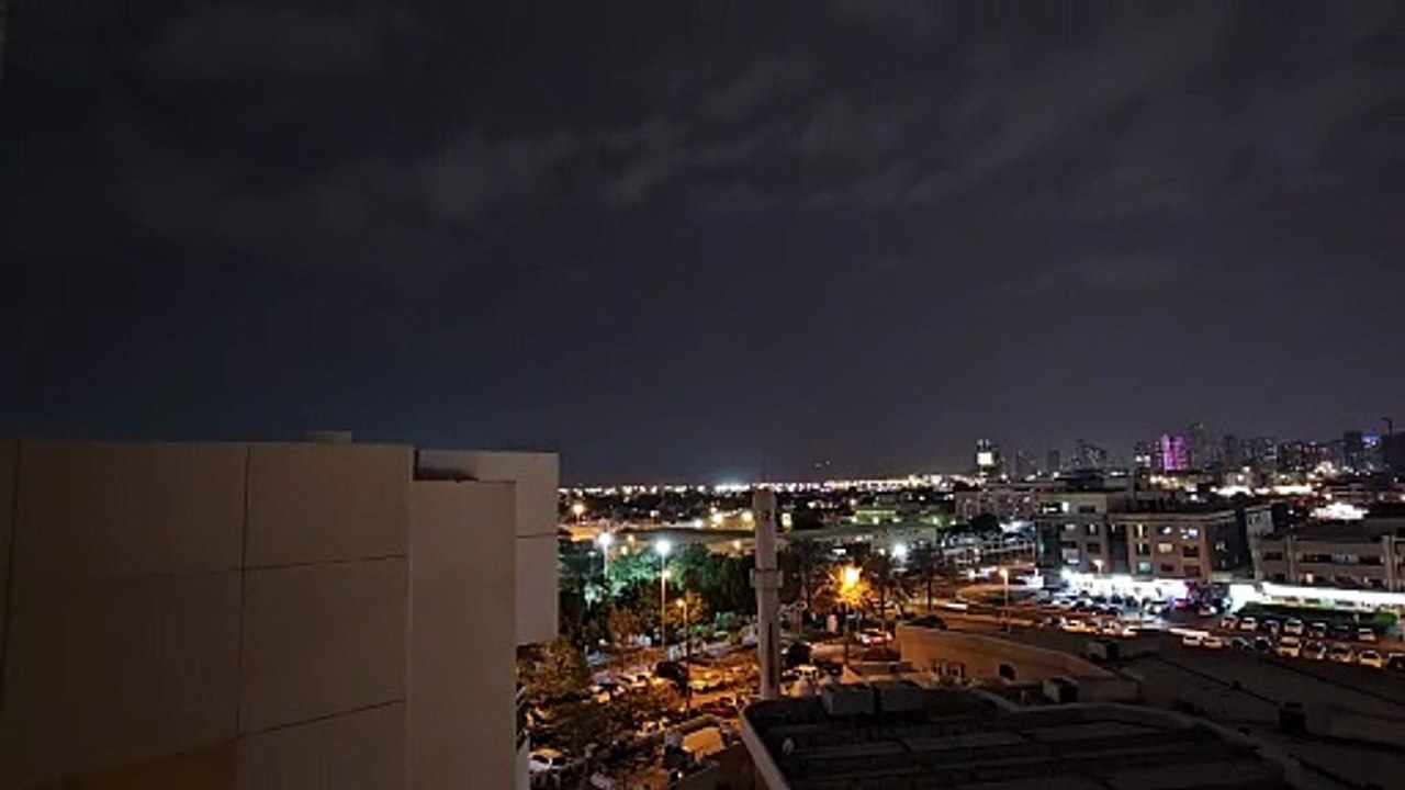 Grey clouds, lightning over Dubai