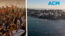 Thousands paddleout at Bondi Beach to pay tribute