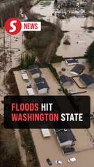 Rescue team navigates flooded roads after extreme weather in Washington State