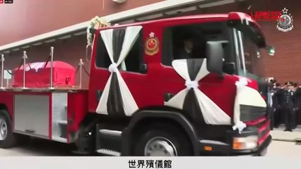 Hong Kong, i funerali del pompiere morto nell'incendio nel complesso residenziale