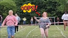 Funny moment as mum takes a tumble during a race at daughter's sports day event