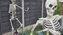 Woman gears up for Halloween by allowing skeletons to take over her garden
