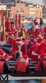 Hundreds of Santas take over Venice’s Grand Canal