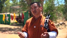 Migrants from Bhutan turn to archery to maintain mental wellbeing and find community in Australia