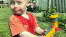 Toddler vs. Garden Hose: The Ultimate Showdown! ⛲