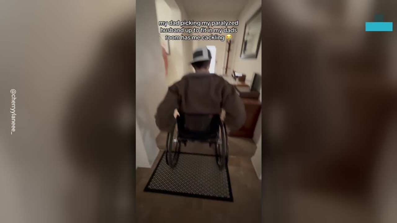 Father Helps Carry Paralyzed Son-in-law to Bedroom