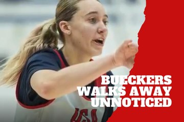 Paige Bueckers casually drills a half court shot and walks away unnoticed