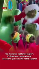 🎄😂 Una niña se acercó al Grinch en un parque temático y, al notar que ella hablaba español, él reaccionó con humor diciendo: “Yo de menso hablando inglés”.