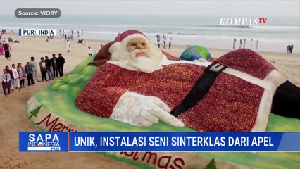 Unik! Seniman India Buat Patung Sinterklas Raksasa dari Pasir dan 1,5 Ton Apel