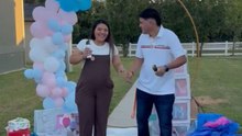 Gender reveal: Parents-to-be reveal they are having a baby girl with pink spray